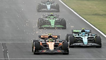 Lando Norris (McLaren MCL39) y Fernando Alonso (Aston Martin AMR25). Hungaroring, Hungría. F1 2025.