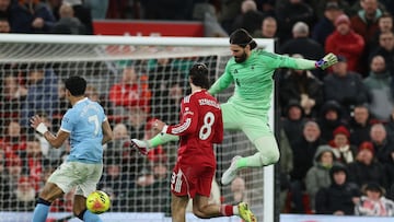 Liverpool took the lead in stunning style, then threw it all away in equally spectacular fashion. City keep pace with Arsenal, who are 6 points clear.