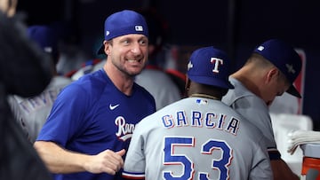 ST PETERSBURG, FLORIDA - OCTOBER 04: Adolis Garcia #53 celebrates with Max Scherzer #31 of the Texas Rangers celebrate after defeating the Tampa Bay Rays 7-1in Game Two of the Wild Card Series at Tropicana Field on October 04, 2023 in St Petersburg, Florida.   Megan Briggs/Getty Images/AFP (Photo by Megan Briggs / GETTY IMAGES NORTH AMERICA / Getty Images via AFP)
