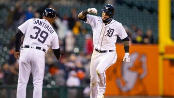 Apr 11, 2022; Detroit, Michigan, USA; Detroit Tigers shortstop Javier Baez (28) celebrates with third base coach Ramon Santiago (39) after hitting a two run home run during the eighth inning against the Boston Red Sox at Comerica Park. Mandatory Credit: Raj Mehta-USA TODAY Sports