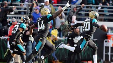 Jan 7, 2018; Jacksonville, FL, USA; Jacksonville Jaguars cornerback Jalen Ramsey (20) celebrates as he intercepted the ball against the Buffalo Bills during the fourth quarter of the AFC Wild Card playoff football game at Everbank Field. Jacksonville Jaguars defeated the Buffalo Bills 10-3. Mandatory Credit: Kim Klement-USA TODAY Sports