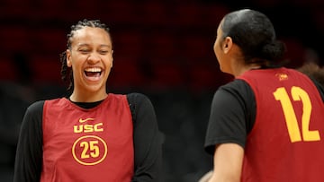 PORTLAND, OREGON - MARCH 29: McKenzie Forbes #25 and JuJu Watkins #12 of the USC Trojans share in a laugh during practice ahead of the Sweet Sixteen and Elite Eight rounds of the NCAA Women's Basketball Tournament on March 29, 2024 in Portland, Oregon.   Steph Chambers/Getty Images/AFP (Photo by Steph Chambers / GETTY IMAGES NORTH AMERICA / Getty Images via AFP)