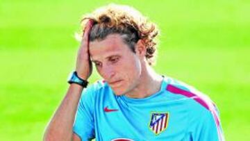 Forlán tiene un esguince y es duda para el Sevilla