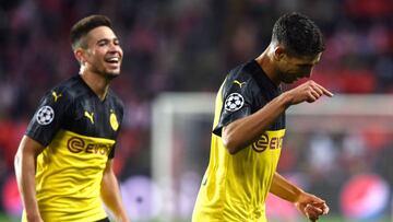 Dortmund's Moroccan defender Achraf Hakimi (R) celebrates scoring the opening goal with his teammates during the UEFA Champions League Group F football match Slavia Prague v BVB Borussia Dortmund in Prague, Czech Republic, on October 2, 2019. (Photo