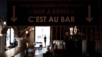 A picture taken on October 9, 2020 in Lyon shows an inside view of a cafe after the city was placed on maximum coronavirus alert. - Four French cities including Lyon are placed on maximum coronavirus alert, joining Paris and other metropolises where bars have been shuttered in an increasingly urgent bid to brake a fast-accelerating outbreak of Covid-19. (Photo by JEFF PACHOUD / AFP)