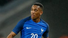 France: Martial form wins recall