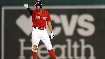 BOSTON, MASSACHUSETTS - JULY 12: Xander Bogaerts #2 of the Boston Red Sox celebrates on second base before being told to round the bases, after hitting a 2 RBI home run in the bottom of the seventh inning of a game against the Los Angeles Dodgers at Fenwa