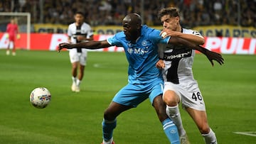 Napoli's Belgian forward #11 Romelu Lukaku fights for the ball with Parma's Italian defender #46 Giovanni Leoni during the Italian Serie A football match between Parma and Napoli at the Tardini stadium in Parma on May 18, 2025. (Photo by Piero CRUCIATTI / AFP)