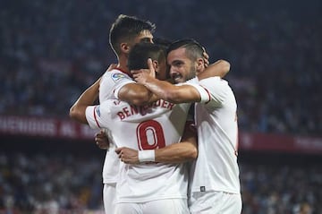 Wissam Ben Yedder celebrates with Pablo Sarabia.