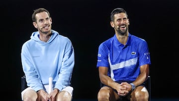 Britain�s Andy Murray (L) reacts with Serbia�s Novak Djokovic during a charity event titled �Night with Novak� on Rod Laver Arena in Melbourne on January 9, 2025 ahead of the Australian Open tennis championship starting on January 12. (Photo by DAVID GRAY / AFP) / -- IMAGE RESTRICTED TO EDITORIAL USE - STRICTLY NO COMMERCIAL USE --