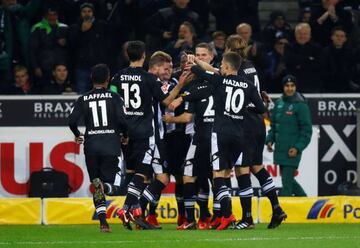 Borussia Mönchengladbach’s Matthias Ginter celebrates scoring their second goal with Thorgan Hazard and team-mates.