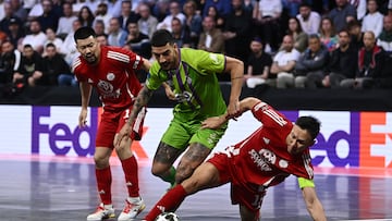 LE MANS, FRANCE - MAY 04: Bruno Gomes of AE Illes Balears Palma is challenged by Dauren Tursagulov and Birzhan Orazov of Kairat Almaty during the UEFA Futsal Champions League Final match between Palma and Kairat Almaty at Antares on May 04, 2025 in Le Mans, France. (Photo by Ben McShane - Sportsfile/UEFA via Getty Images)