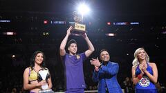 LOS ANGELES, CA - FEBRUARY 17: Devin Booker accepts the trophy for the 2018 JBL Three-Point Contest at Staples Center on February 17, 2018 in Los Angeles, California.   Kevork Djansezian/Getty Images/AFP
 == FOR NEWSPAPERS, INTERNET, TELCOS &amp; TELEVISION USE ONLY ==