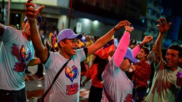 Supporters of Venezuela's President Nicolas Maduro celebrate the results after the presidential election in Caracas, Venezuela July 29, 2024. REUTERS/Maxwell Briceno