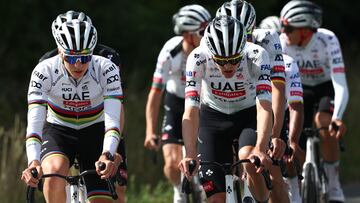 UAE Team Emirate - XRG team's Slovenian rider Tadej Pogacar (L) and teammates cycle in a training session days prior to the start of the 112th edition of the Tour de France cycling race, near Valenciennes, outside Lille, northern France, on July 3, 2025. (Photo by Anne-Christine POUJOULAT / AFP)