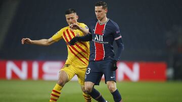 Soccer Football - Champions League - Round of 16 Second Leg - Paris St Germain v FC Barcelona - Parc des Princes, Paris, France - March 10, 2021 Paris St Germain's Julian Draxler in action with Barcelona's Clement Lenglet REUTERS/Gonzalo Fuentes