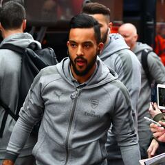 Theo Walcott leaves Arsenal with his belongings in bin bags