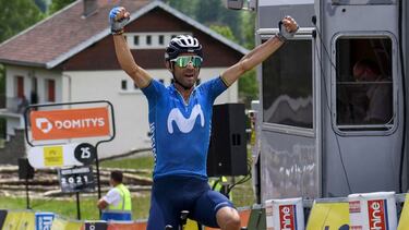 Team Movistar's Alejandro Valverde of Spain celebrates as he crosses the finish line at the end of the sixth stage of the 73rd edition of the Criterium du Dauphine cycling race, a 167km between Loriol-sur-Drome and Le Sappey-en-Chartreuse on June 4, 2021.