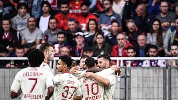 Monaco&#039;s French forward Kevin Volland (R) celebrates with teammates after scoring a goal during the French L1 football match between Clermont Foot 63 and AS Monaco at Stade Gabriel Montpied in Clermont-Ferrand, central France on September 26, 2021. (