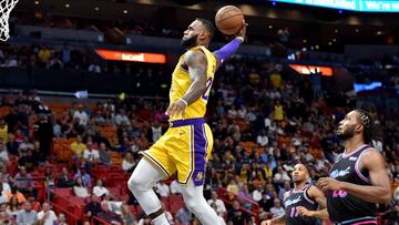 Nov 18, 2018; Miami, FL, USA; Los Angeles Lakers forward LeBron James (23) dunks beside Miami Heat forward Justise Winslow (20) during the first half at American Airlines Arena. Mandatory Credit: Steve Mitchell-USA TODAY Sports