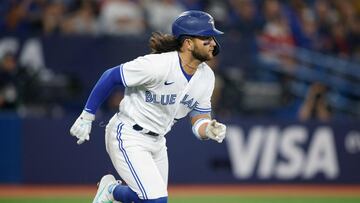 TORONTO, ON - APRIL 14: Bo Bichette #11 of the Toronto Blue Jays runs out a single in the fifth inning of their MLB game at against the Tampa Bay Rays Rogers Centre on April 14, 2023 in Toronto, Canada.   Cole Burston/Getty Images/AFP (Photo by Cole Burston / GETTY IMAGES NORTH AMERICA / Getty Images via AFP)