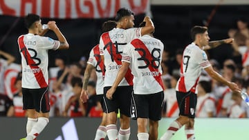 River Plate's forward #38 Ian Subiabre (R) celebrates with teammate midfielder #15 Fausto Vera after scoring his team's second goal during the Argentine Professional Football League 2026 Apertura Tournament match between River Plate and Sarmiento at the Mas Monumental Stadium in Buenos Aires on March 15, 2026. (Photo by ALEJANDRO PAGNI / AFP)