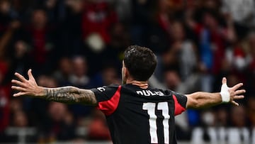 AC Milan's US forward #11 Christian Pulisic celebrates after scoring his team's second goal during the Italian Serie A football match between AC Milan and SSC Napoli at San Siro stadium in Milan, northern Italy, on September 28, 2025. (Photo by Piero CRUCIATTI / AFP)