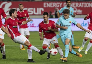 Denis Suárez con Antonio Escribano y Pedro Orfila.