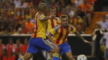 Alc&aacute;cer, Feghouli y Rodrigo.