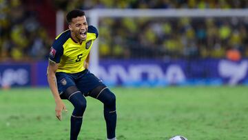 (FILES) In this file photo taken on October 07, 2021 Ecuador's Byron Castillo gestures during the South American qualification football match against Bolivia for the FIFA World Cup Qatar 2022 at the Monumental Stadium in Guayaquil, Ecuador. - Chile's football federation (FFCh) lodged on May 5, 2022 a complaint with FIFA against Ecuador over the alleged ineligibility of full-back Byron Castillo. (Photo by FRANKLIN JACOME / POOL / AFP)