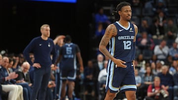 Memphis Grizzlies guard Ja Morant (12) checks into the game during the second quarter against the Detroit Pistons at FedExForum.