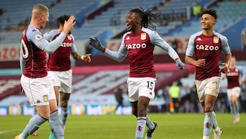 Aston Villa's striker Bertrand Traore (C) celebrates with teammates after scoring their second goal during the English Premier League football match between Aston Villa and Newcastle United at Villa Park in Birmingham, central England on January 23,