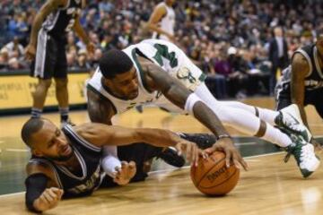 Patty Mills y O.J. Mayo.