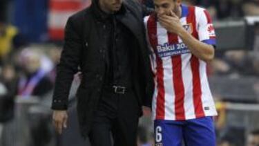 Simeone, con Koke.