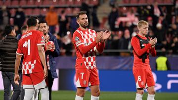 Girona's Uruguayan forward #07 Cristhian Stuani and teammates applaud at the end of the UEFA Champions League, league phase football match between Girona FC and Arsenal FC at the Montilivi stadium in Girona on January 29, 2025. Arsenal won 1-2. (Photo by Josep LAGO / AFP)