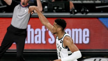 NEW YORK, NEW YORK - JUNE 19: Giannis Antetokounmpo #34 of the Milwaukee Bucks celebrates his three point shot in the first quarter against the Brooklyn Nets during game seven of the Eastern Conference second round at Barclays Center on June 19, 2021 in t