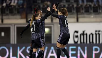 SCHAFFHAUSEN, SWITZERLAND - NOVEMBER 24: Signe Bruun #24 of Olympique Lyonnais celebrate with Melvine Malard #28 and
Daniëlle van de Donk #17 after scoring their team's 3rd goal during the UEFA Women's Champions League group C match between FC Zürich and Olympique Lyon at Wefox Arena on November 24, 2022 in Schaffhausen, Switzerland. (Photo by Christian Kaspar-Bartke/Getty Images)
