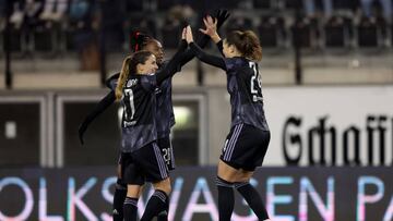 SCHAFFHAUSEN, SWITZERLAND - NOVEMBER 24: Signe Bruun #24 of Olympique Lyonnais celebrate with Melvine Malard #28 and 
Daniëlle van de Donk #17 after scoring their team's 3rd goal during the UEFA Women's Champions League group C match between FC Zürich and Olympique Lyon at Wefox Arena on November 24, 2022 in Schaffhausen, Switzerland. (Photo by Christian Kaspar-Bartke/Getty Images)