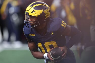 Why isn’t Davis Warren starting at QB for the Michigan Wolverines? Who is his replacement, Alex Orji?