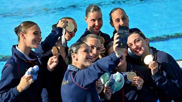 Team Spain poses with their gold medals of artistic swimming team technical event during the LEN European Aquatics Championships in Belgrade, on June 10, 2024. (Photo by Andrej ISAKOVIC / AFP)