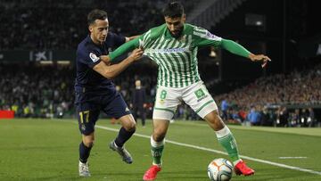 Fekir, con Lucas Vázquez.