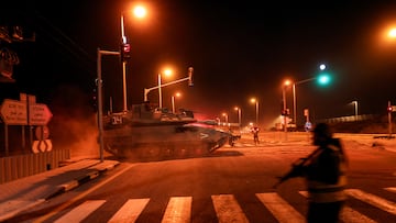 An Israeli soldier maneuvers a tank on a road near Israel's border with the Gaza Strip, in southern Israel, October 12, 2023. REUTERS/Ronen Zvulun