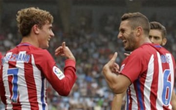 Koke y Antoine Griezmann.