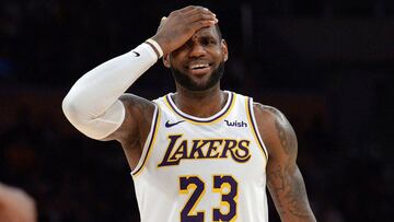 March 24, 2019; Los Angeles, CA, USA; Los Angeles Lakers forward LeBron James (23) reacts after guard Alex Caruso (4) is called for a foul against the Sacramento Kings during the second half at Staples Center. Mandatory Credit: Gary A. Vasquez-USA TODAY Sports