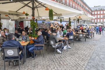 Tottenham supporters on the terraces of Madrid's Plaza Mayor in the hours leading up to the Real Madrid game.