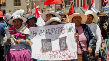 Residents hold a protest against the government of President Dina Boluarte and to demand her resignation, in Puno, Peru, on January 25, 2023. - Shortages of some products, as well as rising fuel and food prices in the southern Andean provinces, the epicenter of the demonstrations demanding the resignation of President Dina Boluarte, are beginning to emerge at a time when there is still no sign of a solution to the crisis in Peru. (Photo by Juan Carlos CISNEROS / AFP) (Photo by JUAN CARLOS CISNEROS/AFP via Getty Images)