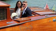 German football player Bastian Schweinsteiger and Serbian tennis player Ana Ivanovic sit in a boat after get married in Venice, Italy, July 12, 2016. REUTERS/Stringer FOR EDITORIAL USE ONLY. NO RESALES. NO ARCHIVES TPX IMAGES OF THE DAY