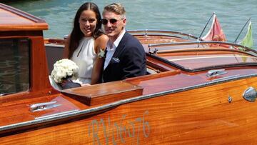 German football player Bastian Schweinsteiger and Serbian tennis player Ana Ivanovic sit in a boat after get married in Venice, Italy, July 12, 2016. REUTERS/Stringer FOR EDITORIAL USE ONLY. NO RESALES. NO ARCHIVES TPX IMAGES OF THE DAY