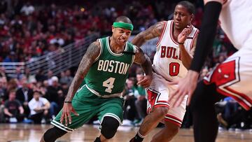 Apr 23, 2017; Chicago, IL, USA; Boston Celtics guard Isaiah Thomas (4) dribbles the ball as Chicago Bulls guard Isaiah Canaan (0) defends during the first half in game four of the first round of the 2017 NBA Playoffs at United Center. Mandatory Credit: Mike DiNovo-USA TODAY Sports