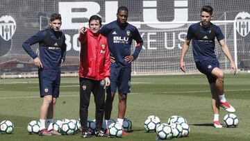 Marcelino, con Mina, Kondogbia y Gabriel.